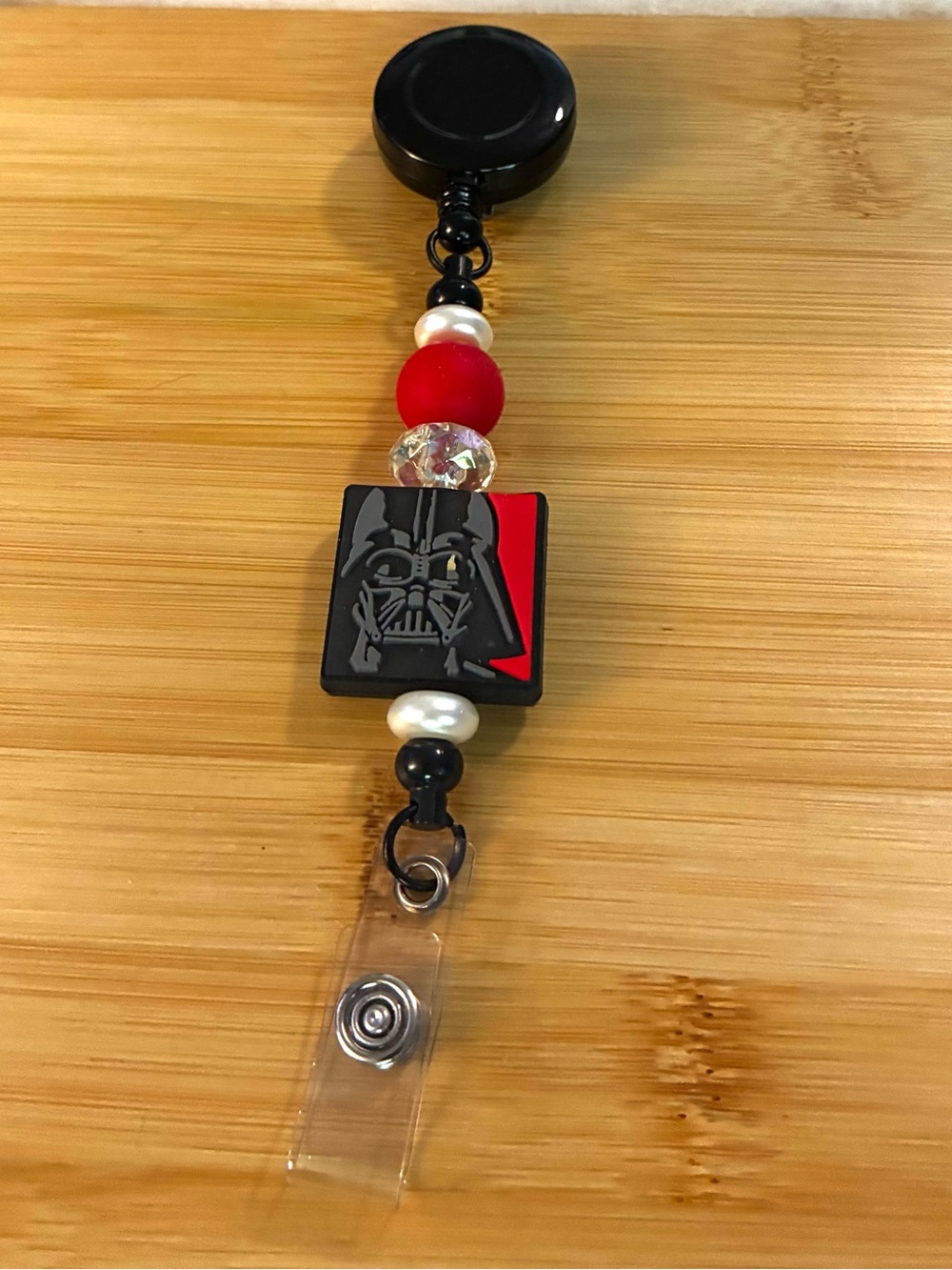 Black and Red Character Beaded Badge Reel